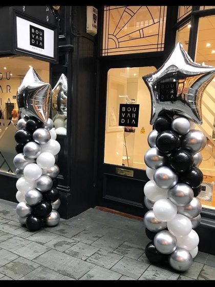 columnas de globo con estrella